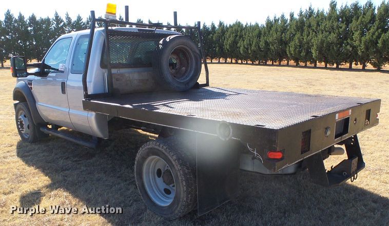 image for item DG0369 2008 Ford F550 Super Duty XLT SuperCab flatbed truck