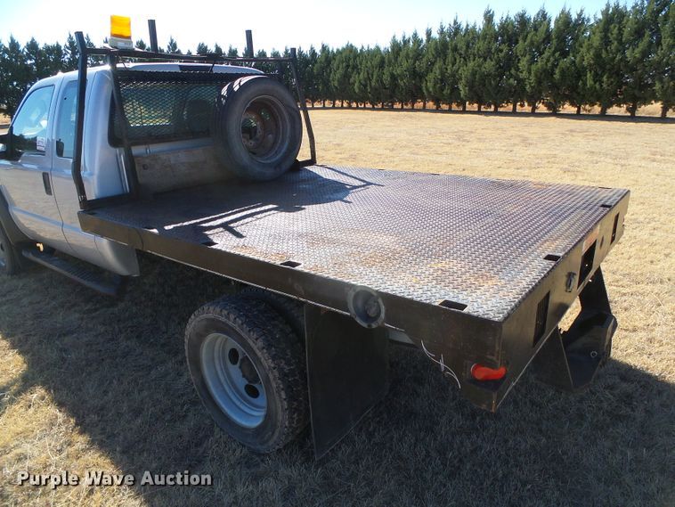 image for item DG0369 2008 Ford F550 Super Duty XLT SuperCab flatbed truck