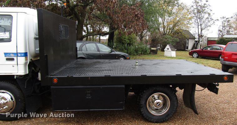 image for item DG6663 1994 Isuzu NPR flatbed truck