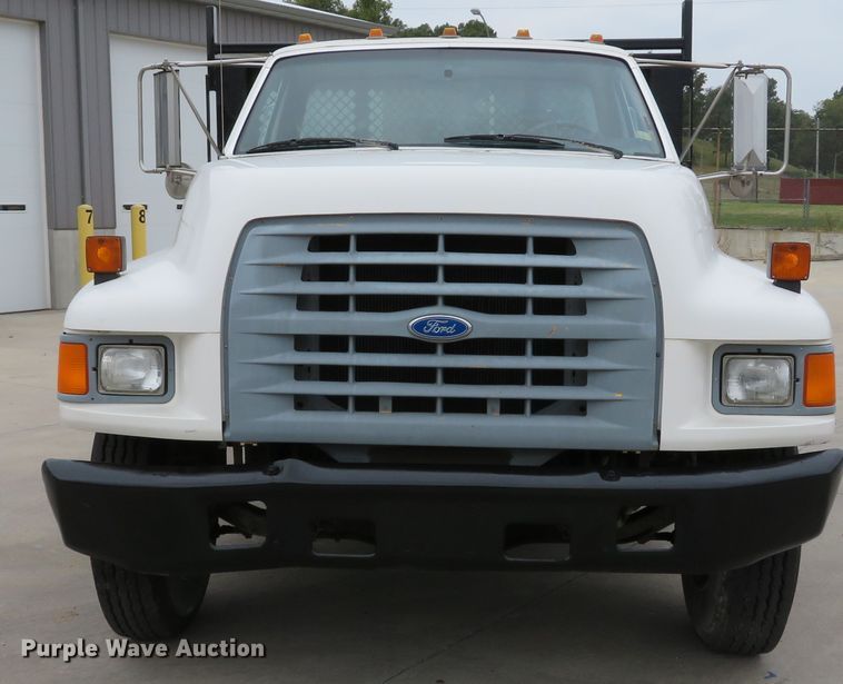 image for item DH1631 1995 Ford F700 flatbed truck