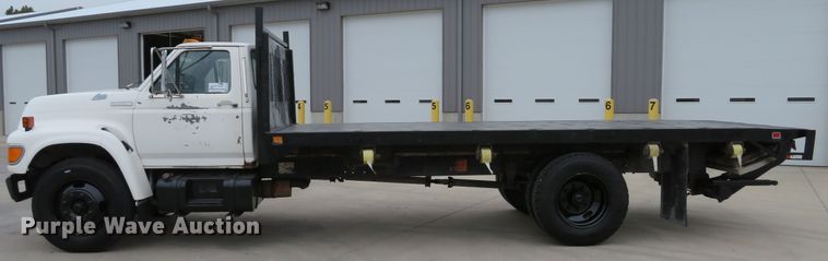 image for item DH1631 1995 Ford F700 flatbed truck