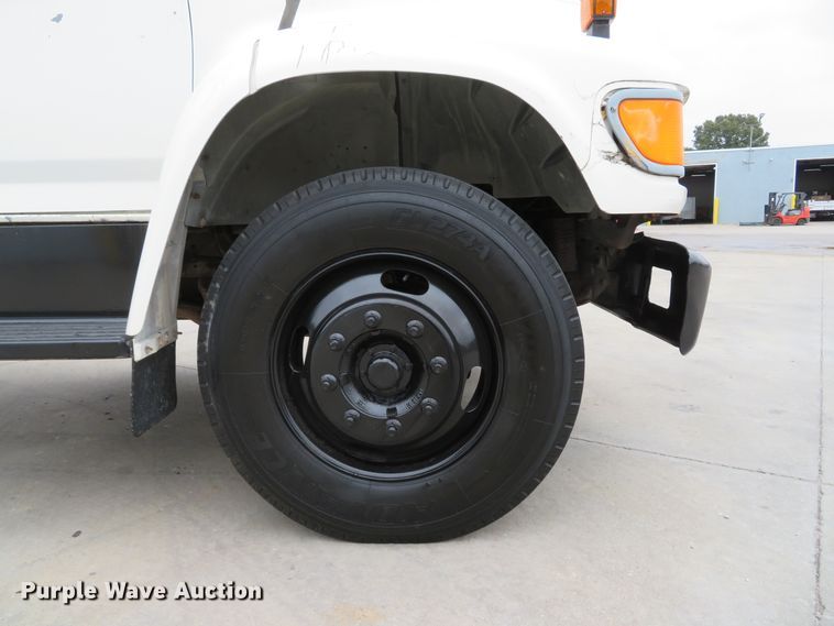 image for item DH1631 1995 Ford F700 flatbed truck