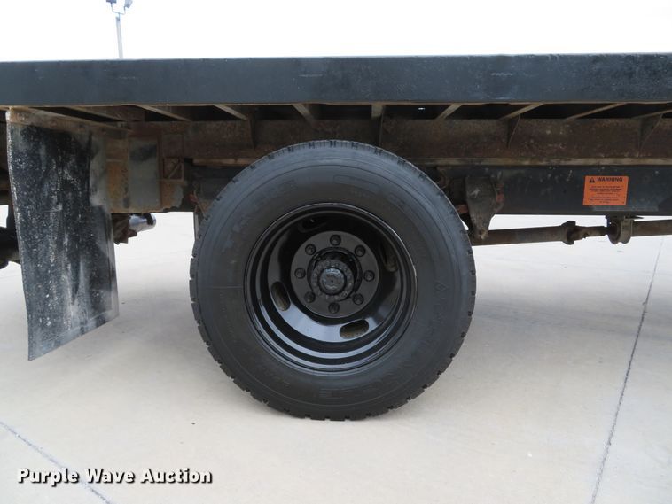 image for item DH1631 1995 Ford F700 flatbed truck