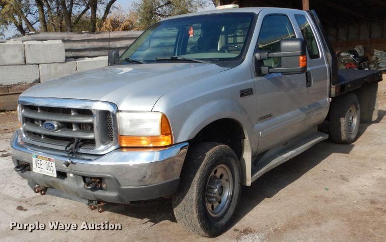 image for item EC9134 2001 Ford F250 Super Duty SuperCab flatbed  pickup truck