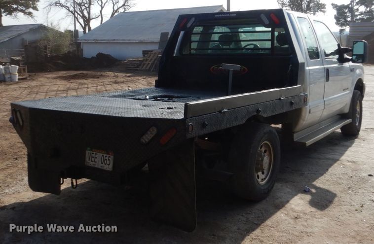 image for item EC9134 2001 Ford F250 Super Duty SuperCab flatbed  pickup truck