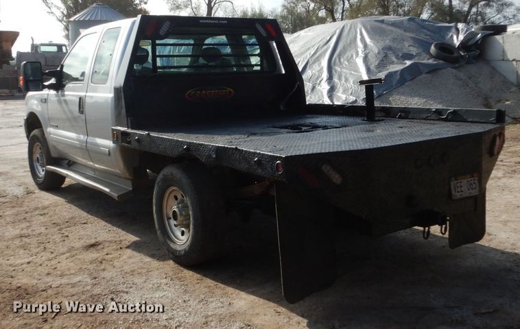 image for item EC9134 2001 Ford F250 Super Duty SuperCab flatbed  pickup truck