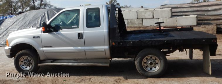 image for item EC9134 2001 Ford F250 Super Duty SuperCab flatbed  pickup truck