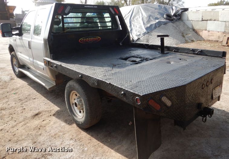 image for item EC9134 2001 Ford F250 Super Duty SuperCab flatbed  pickup truck