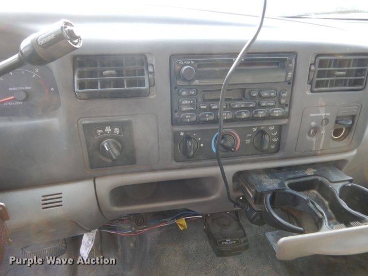 image for item EC9134 2001 Ford F250 Super Duty SuperCab flatbed  pickup truck