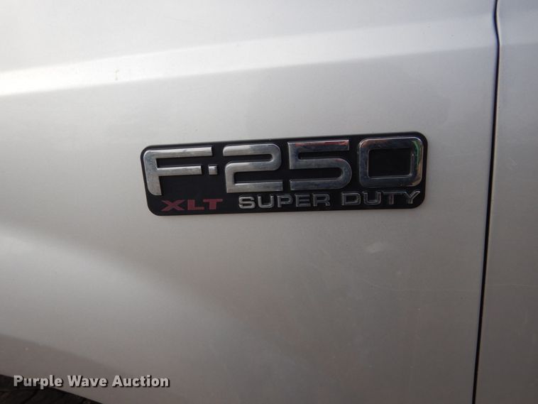 image for item EC9134 2001 Ford F250 Super Duty SuperCab flatbed  pickup truck