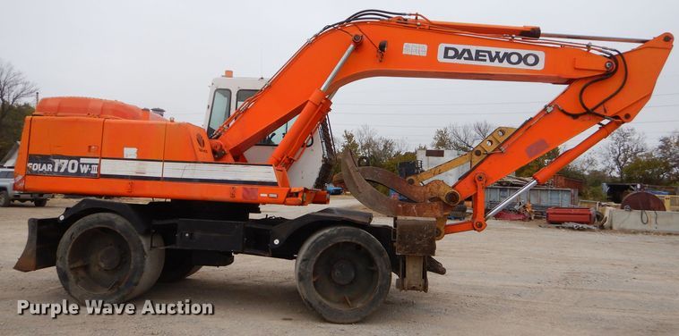 image for item EY9490 1999 Daewoo Solar 170W-III rubber tire excavator