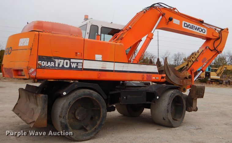 image for item EY9490 1999 Daewoo Solar 170W-III rubber tire excavator