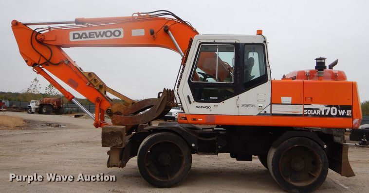image for item EY9490 1999 Daewoo Solar 170W-III rubber tire excavator