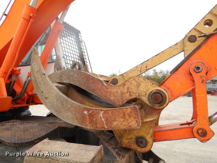 image for item EY9490 1999 Daewoo Solar 170W-III rubber tire excavator