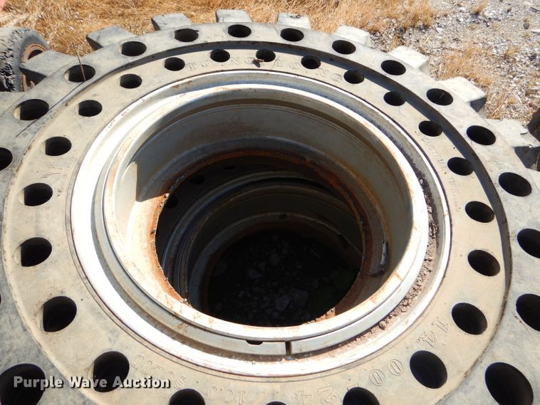 image for item EY9498 (4) 14.00-24 solid tires and wheels