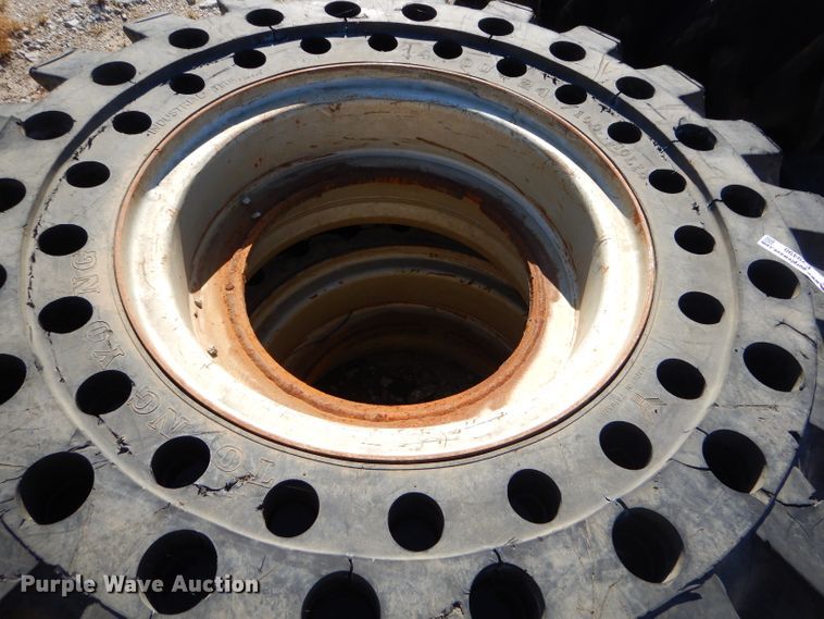 image for item EY9498 (4) 14.00-24 solid tires and wheels