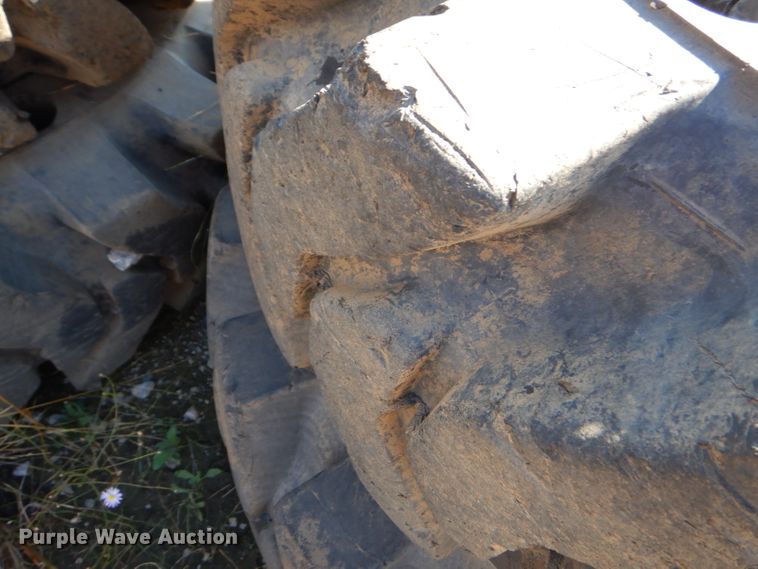 image for item EY9498 (4) 14.00-24 solid tires and wheels