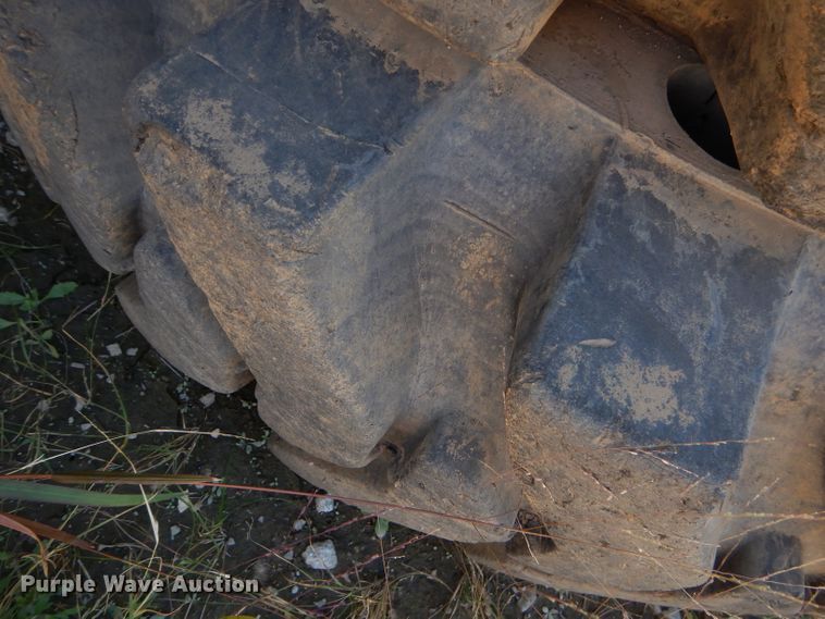 image for item EY9498 (4) 14.00-24 solid tires and wheels