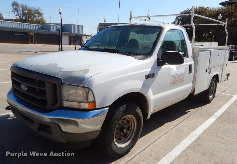 image for item FA9807 2003 Ford F250 Super Duty utility bed pickup truck