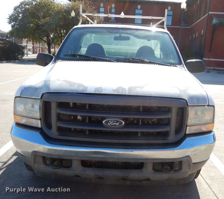 image for item FA9807 2003 Ford F250 Super Duty utility bed pickup truck