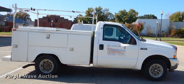 image for item FA9807 2003 Ford F250 Super Duty utility bed pickup truck