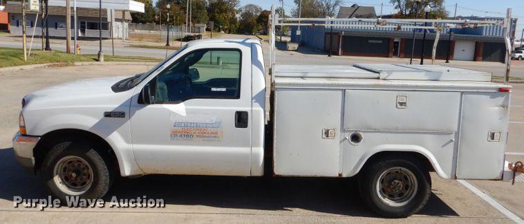 image for item FA9807 2003 Ford F250 Super Duty utility bed pickup truck