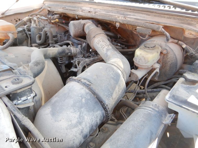 image for item FA9807 2003 Ford F250 Super Duty utility bed pickup truck