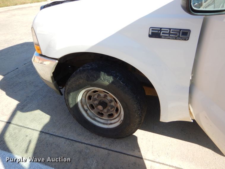 image for item FA9807 2003 Ford F250 Super Duty utility bed pickup truck