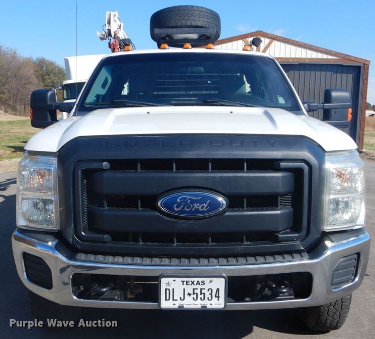 image for item FF9089 2014 Ford F350 Super Duty SuperCab utility bed pickup truck with crane