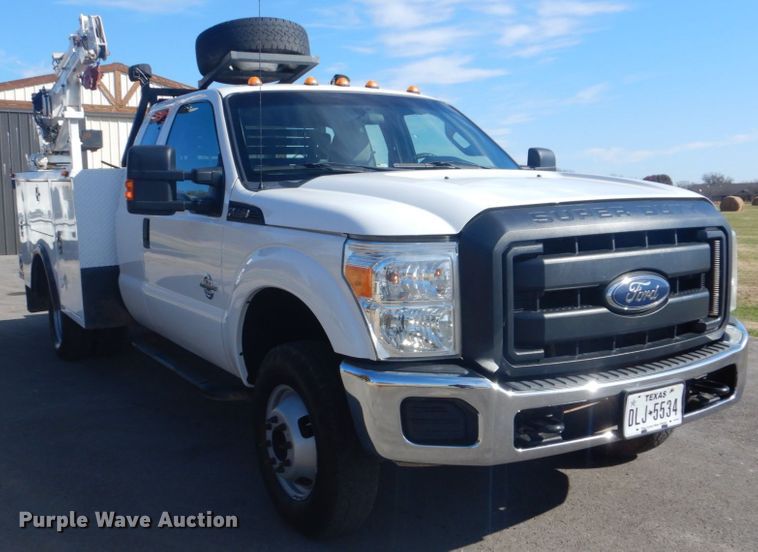 image for item FF9089 2014 Ford F350 Super Duty SuperCab utility bed pickup truck with crane