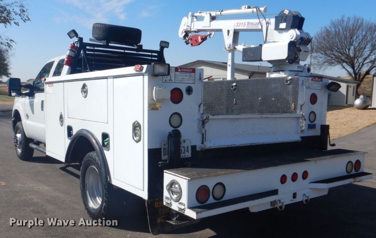 image for item FF9089 2014 Ford F350 Super Duty SuperCab utility bed pickup truck with crane