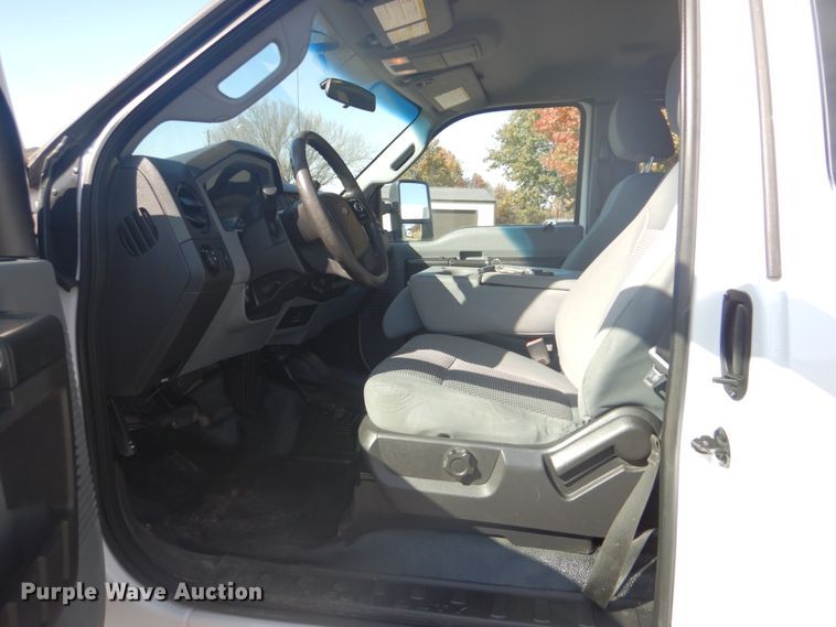 image for item FF9089 2014 Ford F350 Super Duty SuperCab utility bed pickup truck with crane