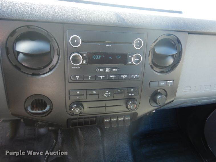 image for item FF9089 2014 Ford F350 Super Duty SuperCab utility bed pickup truck with crane