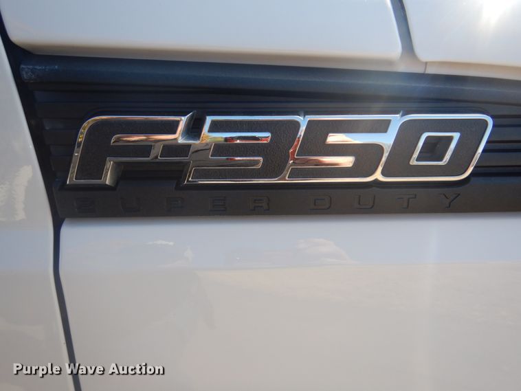 image for item FF9089 2014 Ford F350 Super Duty SuperCab utility bed pickup truck with crane