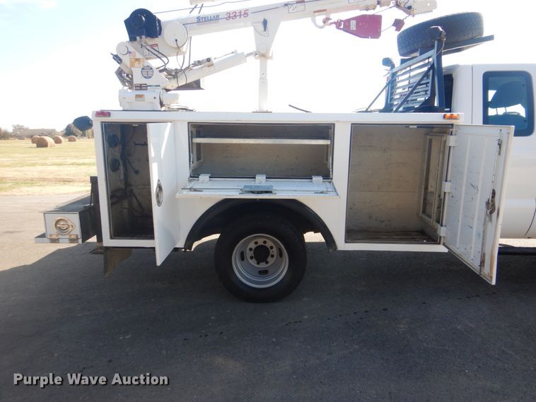 image for item FF9089 2014 Ford F350 Super Duty SuperCab utility bed pickup truck with crane