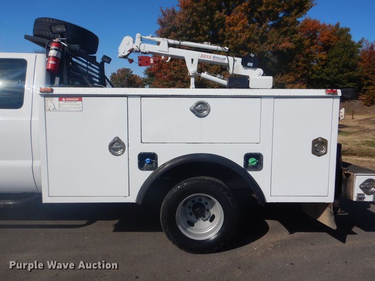 image for item FF9089 2014 Ford F350 Super Duty SuperCab utility bed pickup truck with crane