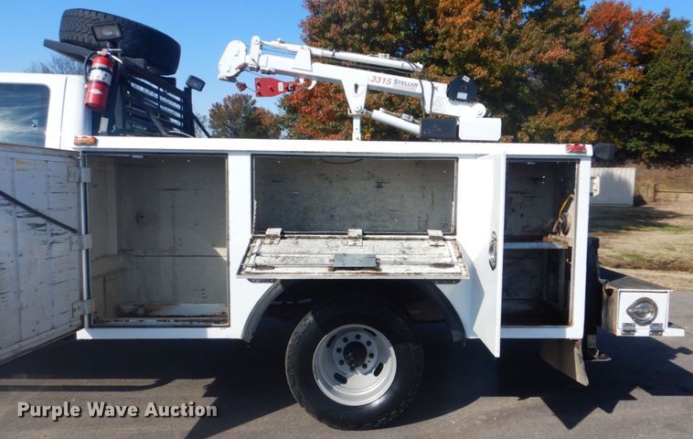 image for item FF9089 2014 Ford F350 Super Duty SuperCab utility bed pickup truck with crane