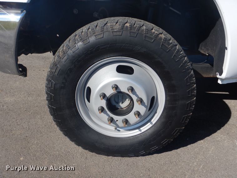 image for item FF9089 2014 Ford F350 Super Duty SuperCab utility bed pickup truck with crane