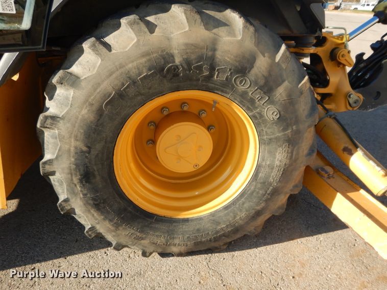 image for item DH2684 2015 John Deere 310SK backhoe