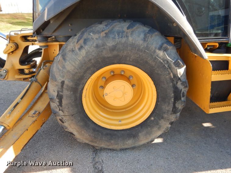 image for item DH2684 2015 John Deere 310SK backhoe