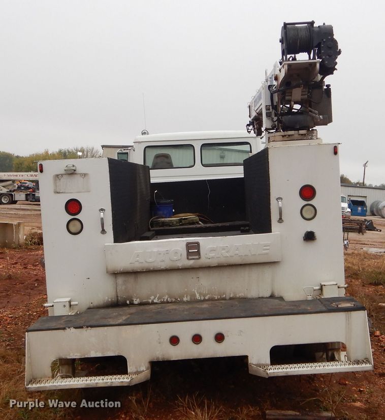 image for item DH6756 2000 Freightliner FL70 utility bed truck with crane