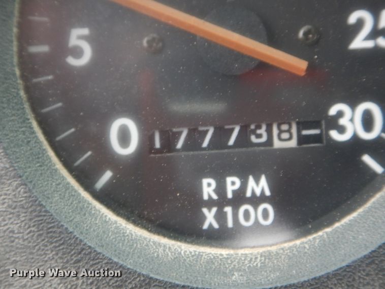 image for item DH6756 2000 Freightliner FL70 utility bed truck with crane