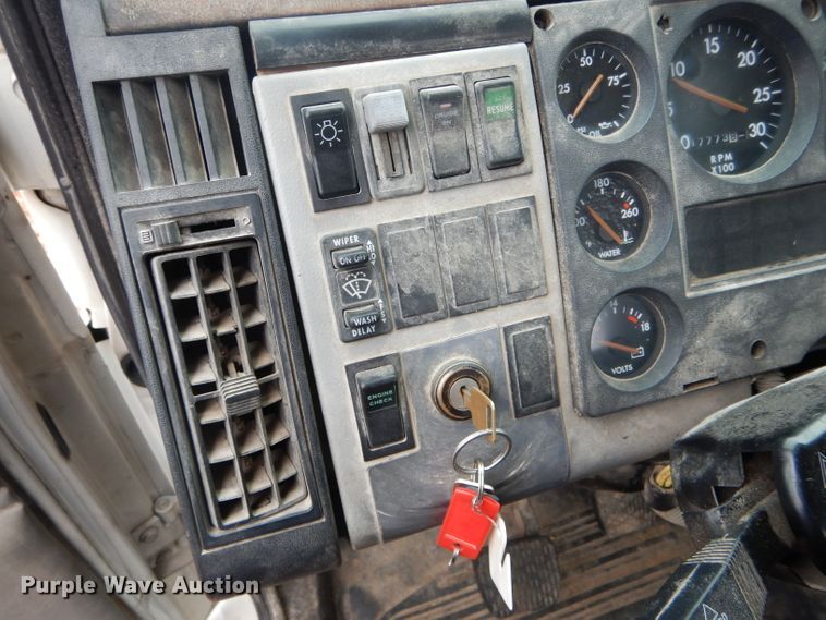 image for item DH6756 2000 Freightliner FL70 utility bed truck with crane