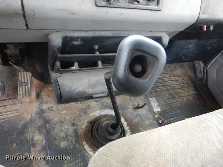 image for item DH6756 2000 Freightliner FL70 utility bed truck with crane