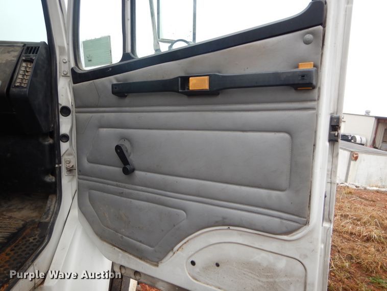 image for item DH6756 2000 Freightliner FL70 utility bed truck with crane