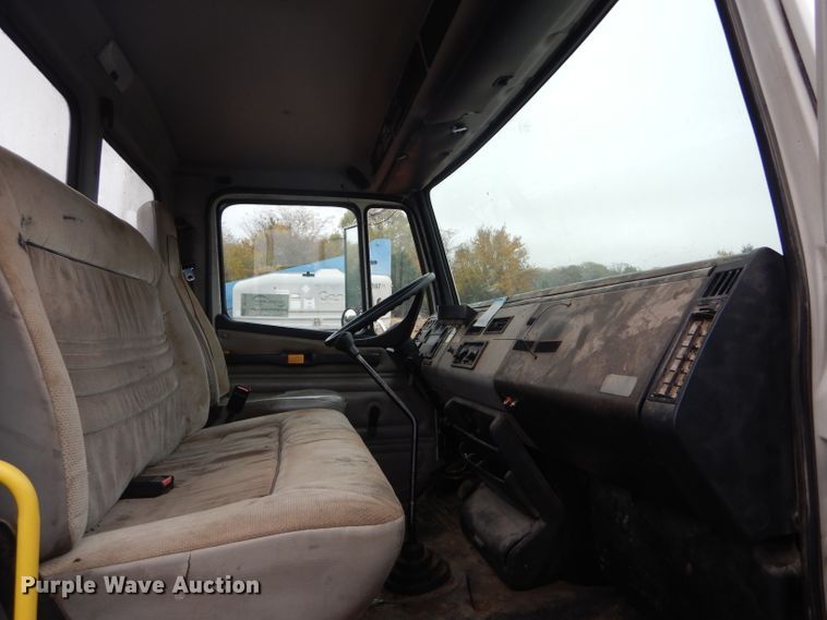 image for item DH6756 2000 Freightliner FL70 utility bed truck with crane