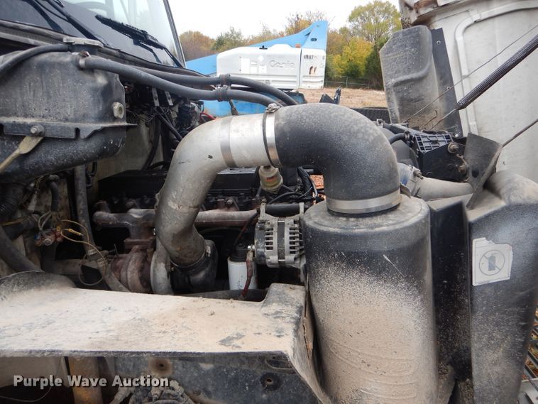 image for item DH6756 2000 Freightliner FL70 utility bed truck with crane