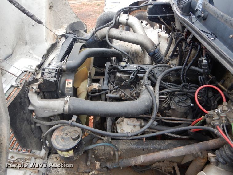 image for item DH6756 2000 Freightliner FL70 utility bed truck with crane