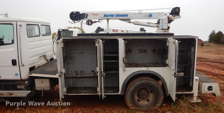 image for item DH6756 2000 Freightliner FL70 utility bed truck with crane