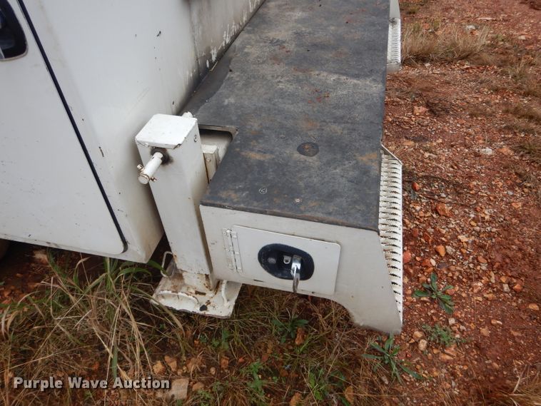 image for item DH6756 2000 Freightliner FL70 utility bed truck with crane